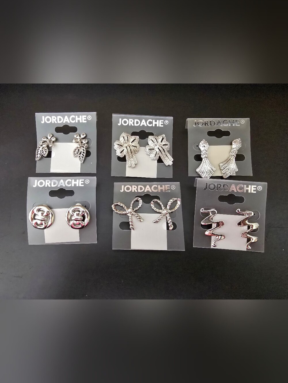 Vintage Jordache silver toned earrings bundle 6 pairs, costume jewelry.